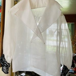 Perfect for the holidays! This blouse will set you apart from the crowd!